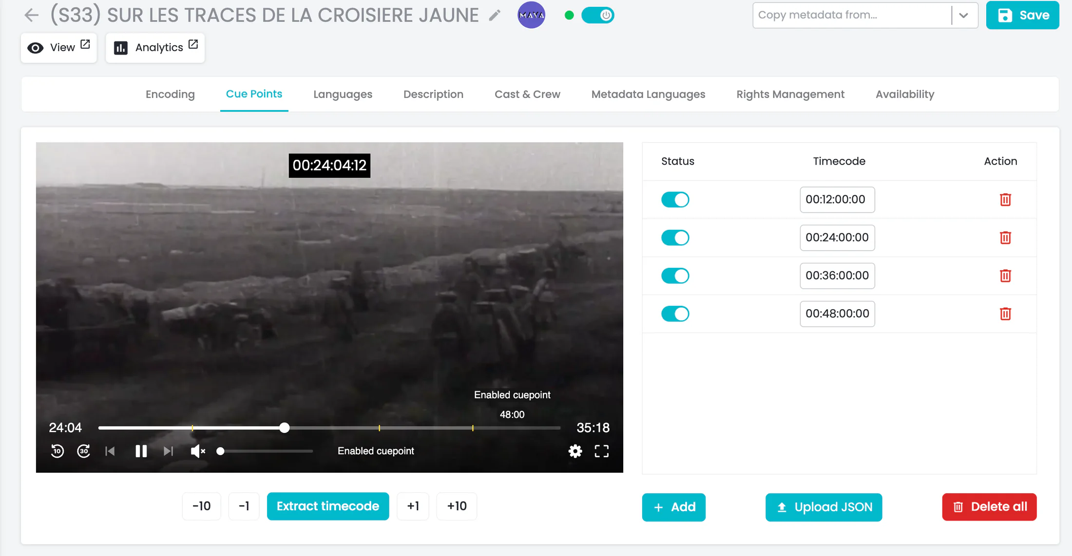 OKAST Channels interface showing the placement and verification of advertising cue points on a video.
